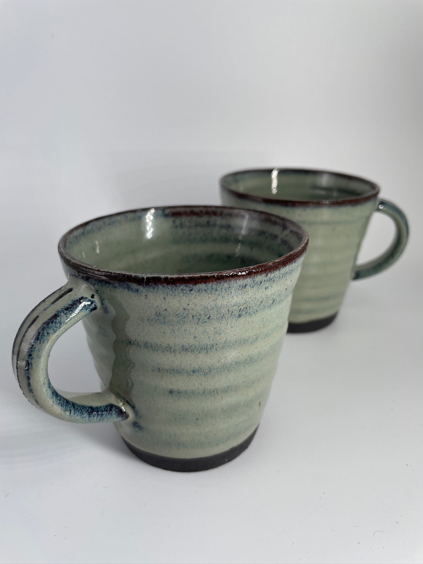 2 green mugs - medium/8oz