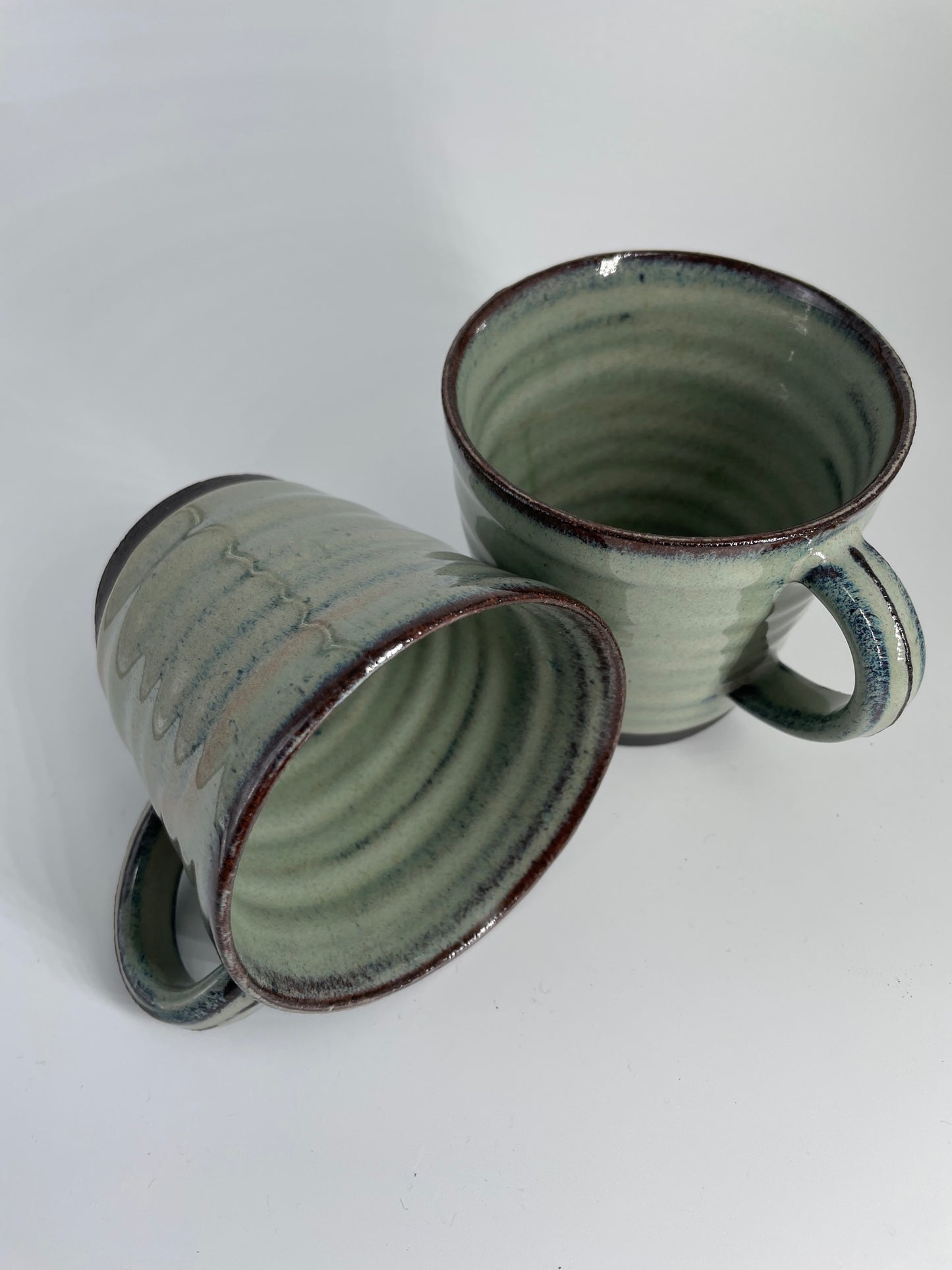 2 green mugs - medium/8oz
